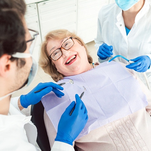 Patient smiling at denture dentist in Fort Myers