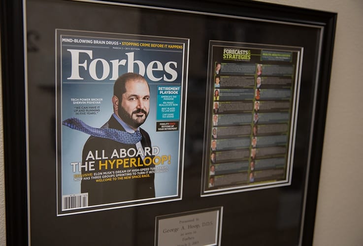 Cover of Forbes Magazine featuring dental office